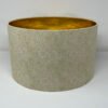 Marigold drum lampshade with a gold mirror lining