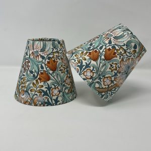 William Morris Golden Lily candle clip shades in orange and teal by Fait par Moi