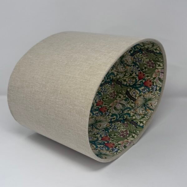 Handmade oval lampshade with natural linen exterior and William Morris Golden Lily floral fabric lining