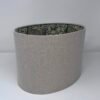 Handmade oval lampshade with natural linen exterior and William Morris Golden Lily floral fabric lining