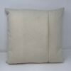 Rear envelope cushion in Alora Parchment fabric by Fait par Moi