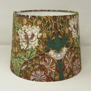 Handmade gold lampshade featuring the William Morris Honeysuckle & Tulip floral pattern by Fait Par Moi.