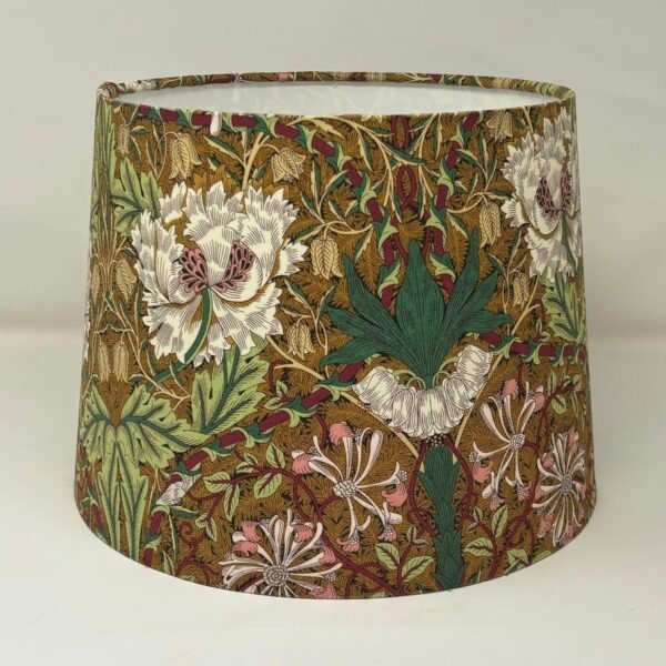 Handmade gold lampshade featuring the William Morris Honeysuckle & Tulip floral pattern by Fait Par Moi.