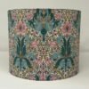 Handmade teal lampshade featuring the William Morris Spring Thicket floral pattern by Fait Par Moi.
