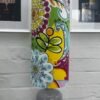 Calvados colourful tall cylinder lampshade featuring bold floral patterns in yellow, green, pink and turquoise